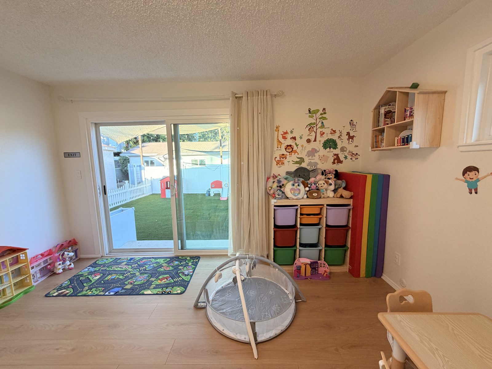Toy shelves by the garden door
